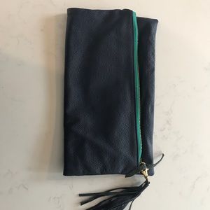 K. Slademade foldover clutch. Never used.